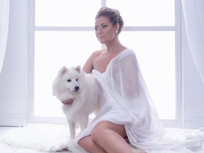 Shadow of a moving person on a white wall.